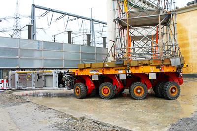 The air is highly charged as two self-propelled Cometto SPMT combinations begin to move in an electricity substation in Grossgartach / Leingarten in Germany.