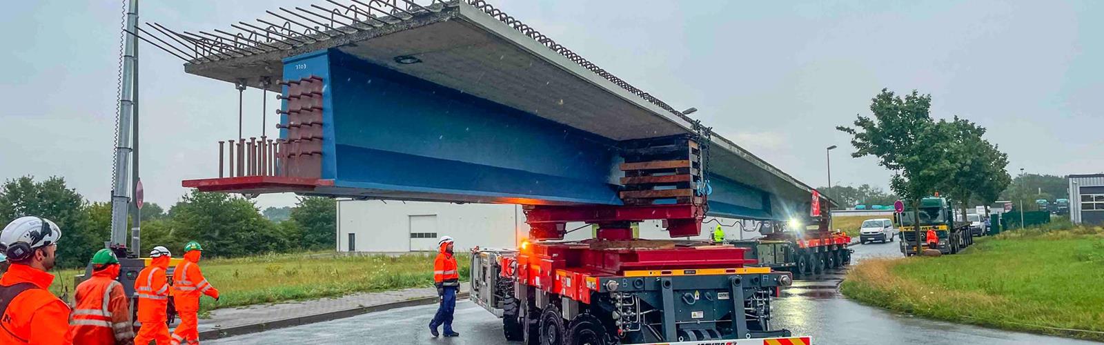 Транспортировка сегментов моста на SPMT с поворотным кругом