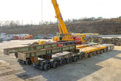 A kind of ram was bolted to the self-propelled module Cometto SPMT vehicle to push the bridge into the final position.